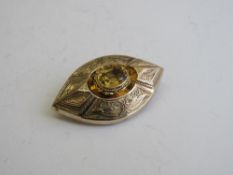 Tested 9ct gold Victorian citrine brooch, weight 10gms, length 4.5cms. Estimate £200-250.