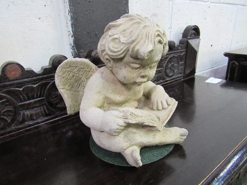 Moulded stone-like Putto with book. Estimate £20-30. - Image 2 of 2