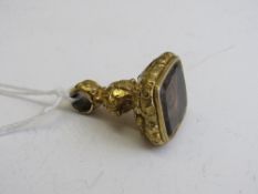 18ct gold (tested) & citrine fob, citrine measures 1.8x1.5cms. Estimate £60-80.