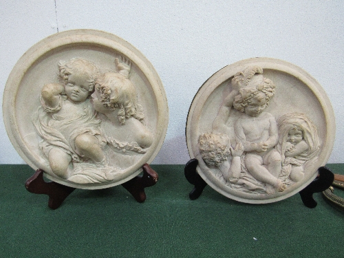 1 Putti circular plaque signed E W Wyon & 1 other not signed. Estimate £30-50. - Image 3 of 3