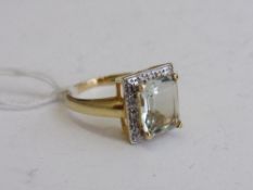 Silver gilded lady's ring with a pale green stone, size R. Estimate £25-35.