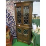 Old charm style oak corner display cabinet, height 170cms. Estimate £10-20.