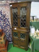 Old charm style oak corner display cabinet, height 170cms. Estimate £10-20.