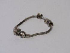 Pandora bracelet 925 silver with car & 'I love you' charms. Estimate £40-50.