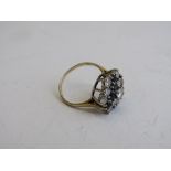 Lady's 9ct yellow gold cluster ring with blue & white stones, size N 1/2, weight 3.2gms. Estimate £