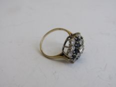 Lady's 9ct yellow gold cluster ring with blue & white stones, size N 1/2, weight 3.2gms. Estimate £