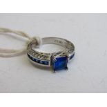 10ct white gold with blue stone ring, size P, weight 4.7gms. Estimate £50-60.