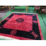 Red & black Chinese carpet, 270 x 244.