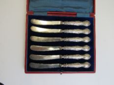 Boxed set of 6 silver handled fruit knives, hallmarked Sheffield 1903 & 2 silver plate topped