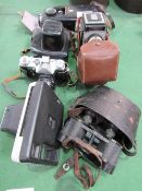 Vintage Carl Zeiss binoculars in a case, Zenit-e Moshva 80 camera in a case, Flexaret Meopta