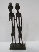 Alberto Giacometti inspired bronze sculpture of man & woman, 12 inch tall. Estimate £20-40.