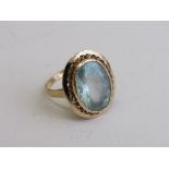 18ct large pale aquamarine ring, size M, weight 6.9gms. Estimate £300-400.