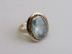 18ct large pale aquamarine ring, size M, weight 6.9gms. Estimate £300-400.