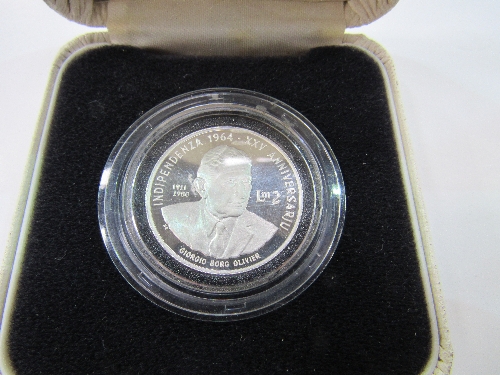 Maltese 25th anniversary of Independence coin in a box. Estimate £20-30.