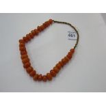 String of Butterscotch, amber, Bakelite celluloid prayer necklace. Estimate £30-50.