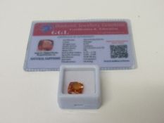 Natural cushion cut orange loose sapphire, 8.30 carat, with certificate. Estimate £50-70.