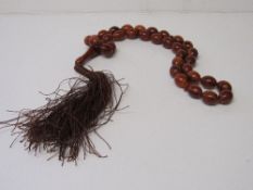 Vintage carved horn bead necklace. Estimate £70-80.