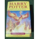 Harry Potter 1st edition, Order of The Phoenix with dust cover. Estimate £30-40.