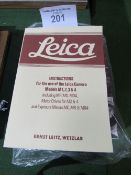 3 Leica camera related books & a book on classic cameras. Estimate £10-20.