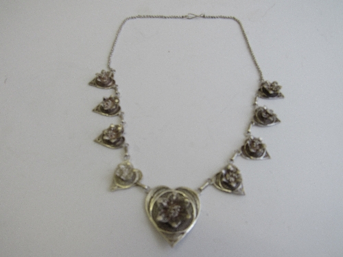 Siam silver necklace of hearts & flowers. Estimate £20-30.