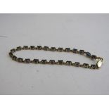 10ct gold & sapphire bracelet. Total weight 6.6gms. Estimate £50-80.