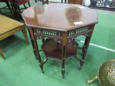 Mahogany octagonal display table with fretted supports to legs & under shelf, diameter 75cms.