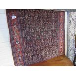 Blue ground multi-patterned wool carpet, 155 x 126. Estimate £20-40.