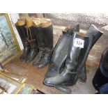 5 pairs of riding boots with two wooden trees