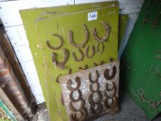 Large display board of horse shoes