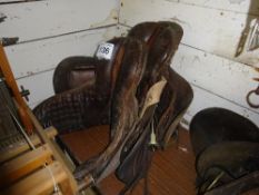 3 leather saddles