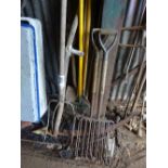 Quantity of assorted hand tools, forks, spades etc