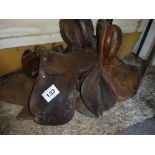 4 vintage leather saddles