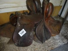 4 vintage leather saddles
