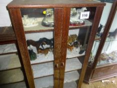 Display cabinet and contents - shire horses and wolves