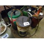 2 oil dispensing buckets
