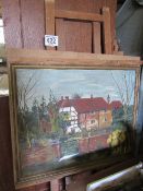 Painting of a Cottage by the River on an easel