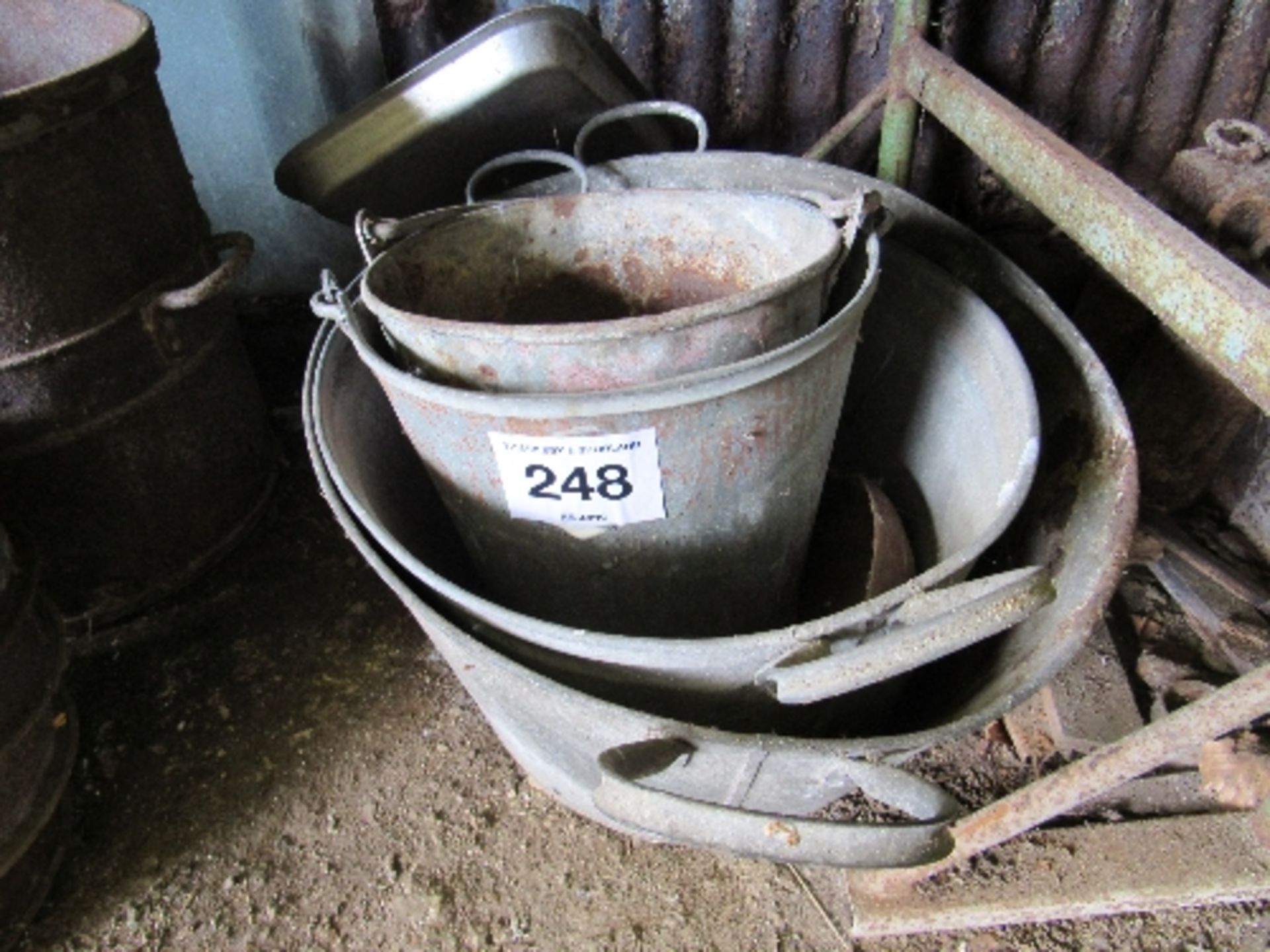 2 tin baths and 2 buckets