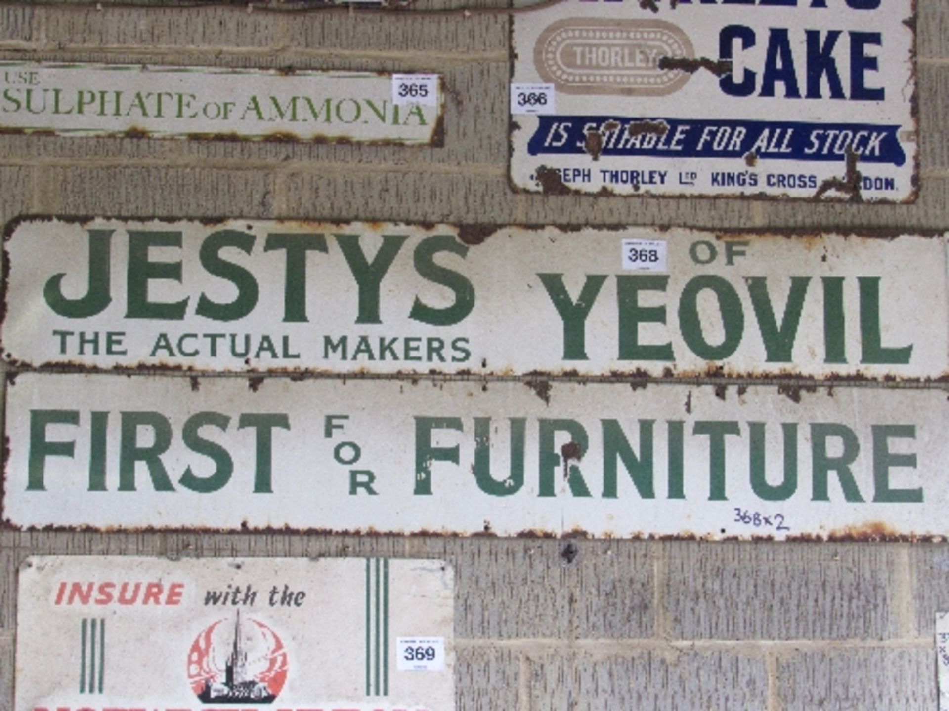 Jestys of Yeovil and First for Furniture enamel signs 185cm x 31cm