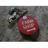 Farm shop sign, tin coat with cow under a tree