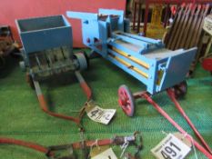 Model baler and one other