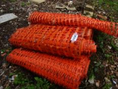 4 rolls of red plastic barrier netting