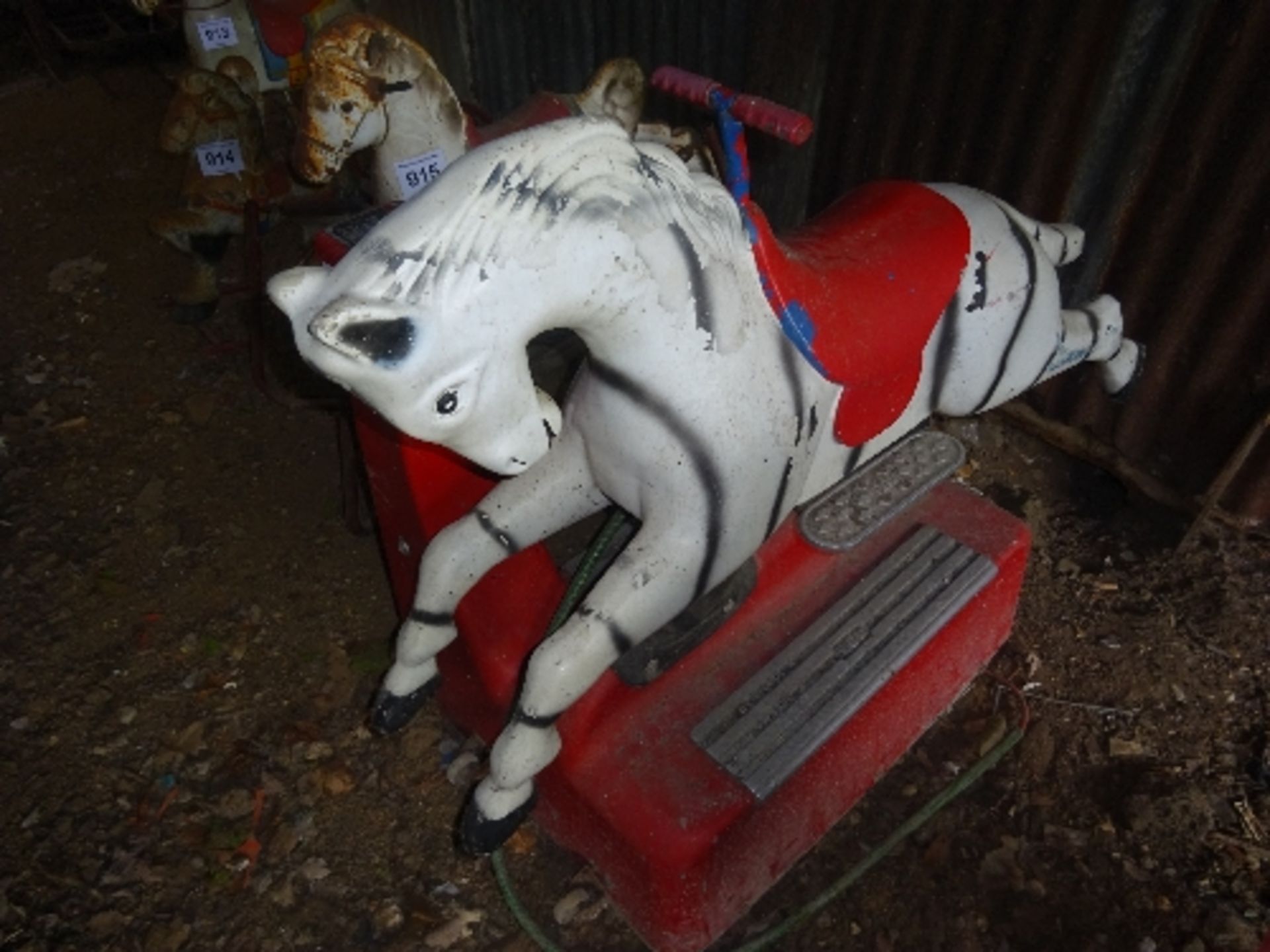 R G M coin operated childs ride