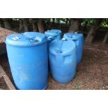 5 blue plastic drums