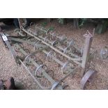 Mounted spring tyne harrows