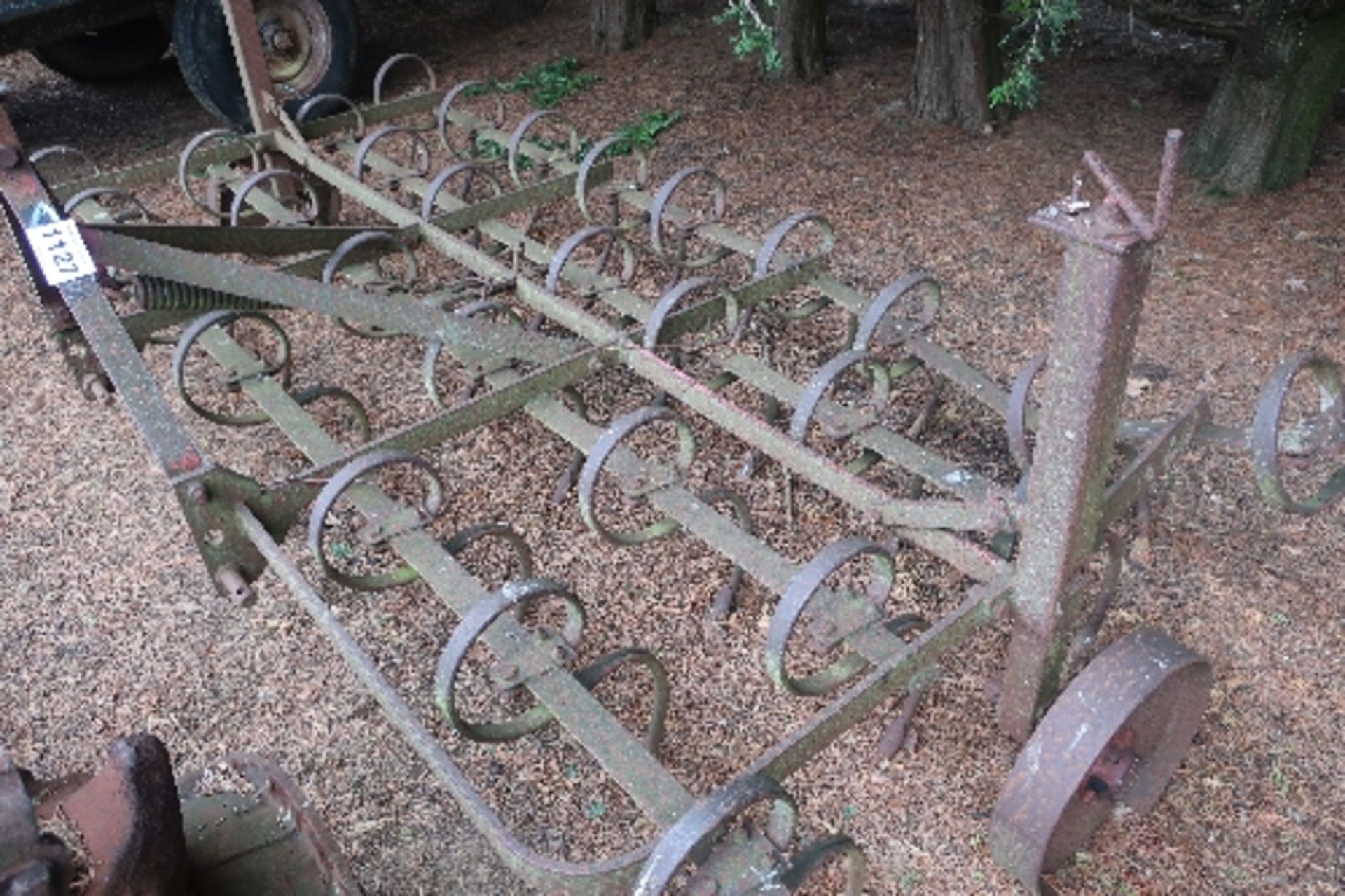 Mounted spring tyne harrows