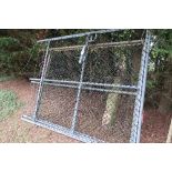 Pair of tubular steel galvanised mesh covered yard gates