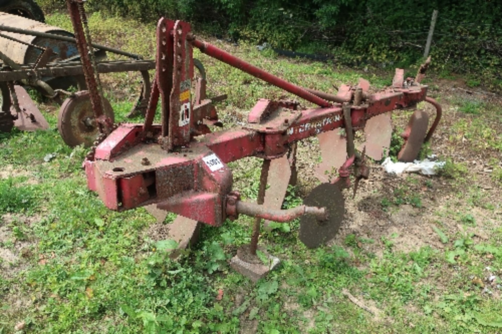 International 300 4 furrow mounted plough