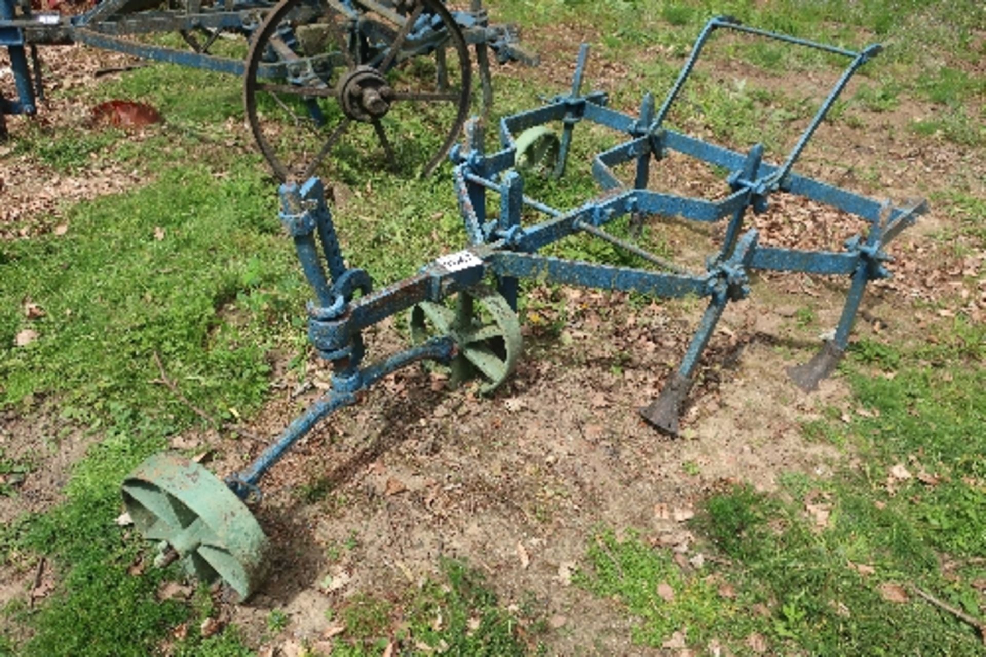Adjustable horse drawn 'duck foot' fixed tyne cultivator