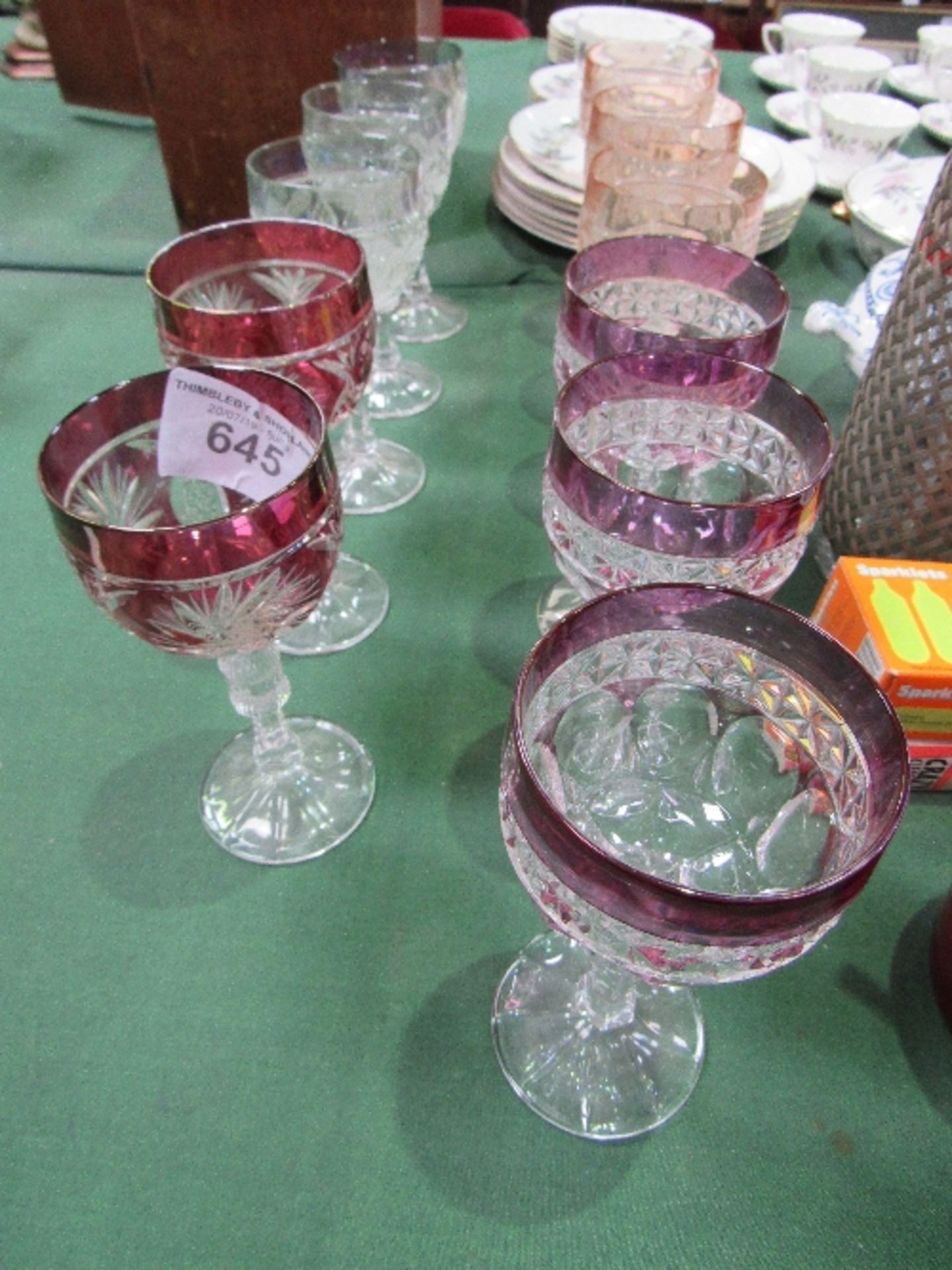 3 sets of 3 + 1 set of 2 Bohemian hock glasses by Nachtmann. Estimate £60-80.