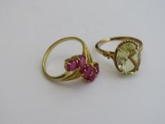 2 gold overlay on silver rings, red stone & topaz, both size R. Estimate £25-35.